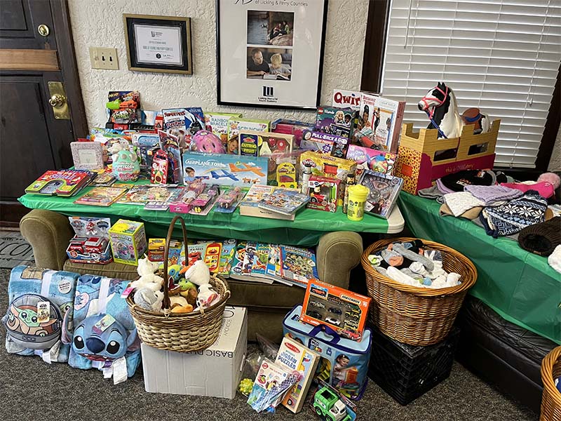 BIG BROTHER AND BIG SISTERS toys, giving